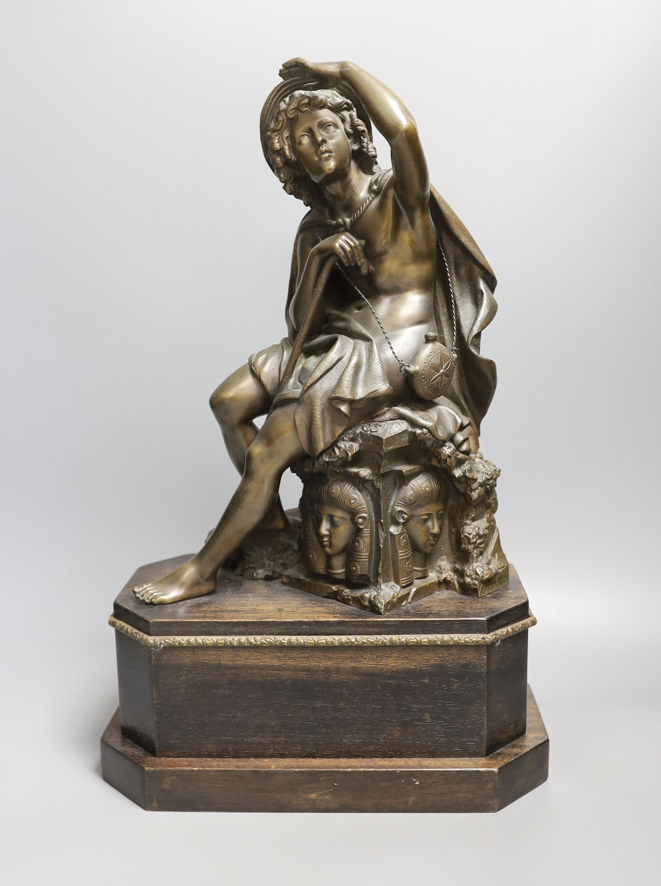 After Coinchon -a 19th century bronze seated shepherdess, 45 cms high including base.